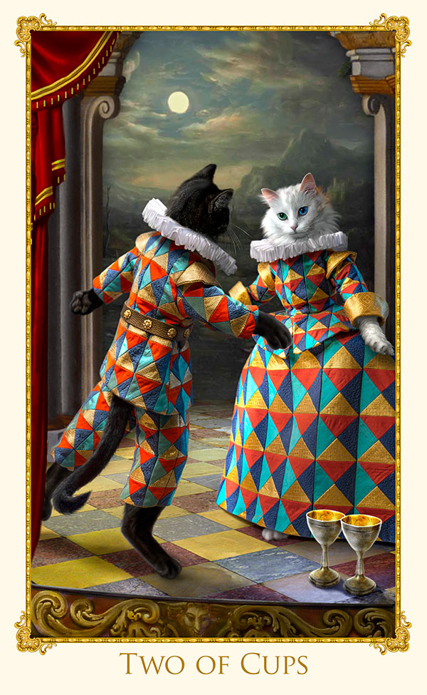 Bohemian Cats Tarot, Two of Cups shows two cats dressed in harlequin costumes. 