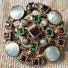 Antique Austro-hungarian "suffragette" brooch. Garnets and mother of pearl.