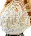 devil or satyr and woman carved shell lamp