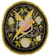 Antique embroidered parrot on perch.