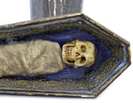 Carved bone skull,  mori, 18th century antique skeleton in carved coffin