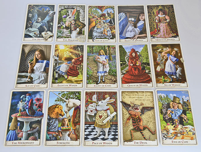 The Alice Tarot cards, white rabbit, red queen, eat me, drink me, caterpillar, red queen