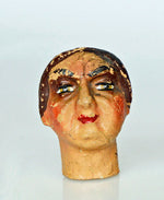 Antique puppet heads. Bizarrely interesting!