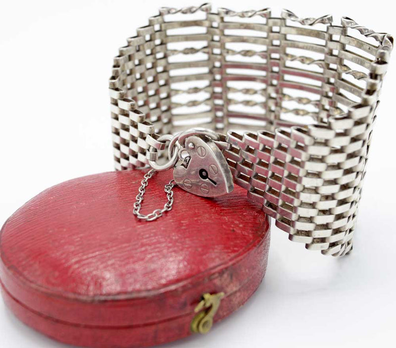 Gate bracelet with antique jewellery box, sterling silver bracelet with heart padlock.